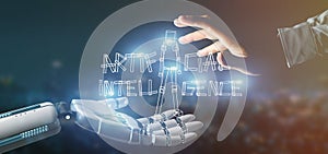 Cyborg hand holding a Artificial inteligence robot made of light