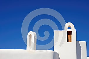 cycladic architecture against a blue sky