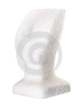 Cycladic head carved from white marble isolated