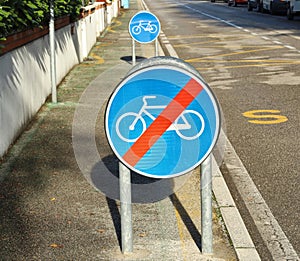 Cycle path end sign and behind it the sign of bike path