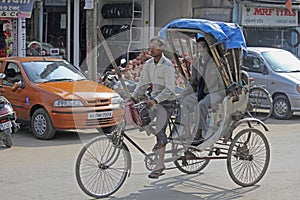 A cycle rickshaw