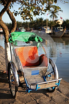 Cycle rickshaw a human powered transport in Asia photo