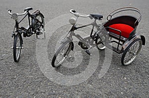 Mini bicycle and trishaw model for present at Medan Indonesia photo