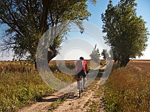 Cycling along farm track