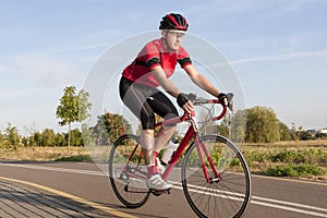 Cycling Concepts and Ideas. Male Caucasian Road Cyclist During R