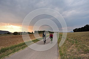 Cycling couple on a road