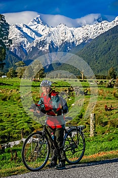 Cycling in front of Mount Cook