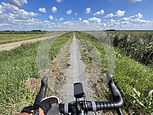 Cycling on a gravel path around Nij Beets