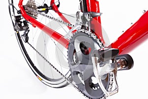 Cycling Ideas. Crankset and Rear Cassette with New Chain. Against White