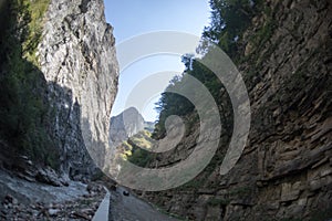 Cycling mountain road. Misty mountain road in high mountains.. Cloudy sky with mountain road. Summertime