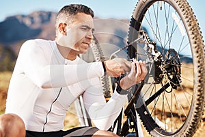 Cycling, repair and wheel with man and focus for sports, wellness and fitness training. Insurance, safety and tire
