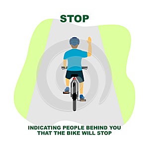 Cycling rules for traffic safety, stop bicycle hand signals. photo
