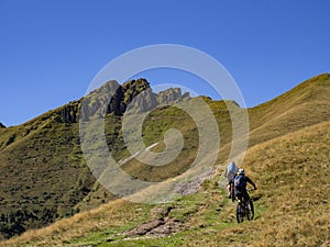 Cycling scene in the alps of Intelvi Valley