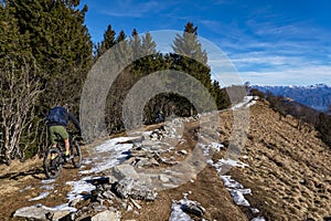 Cycling scene in the alps of Intelvi Valley