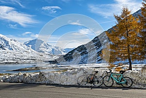 Cycling scene in winter in the italian alps