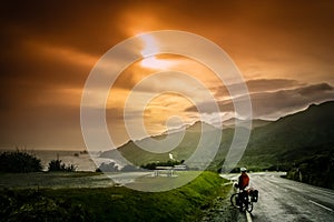 Cyclist admiring sunset