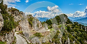 Cyclist athletes admiring the Garda Lake from Passo Tremalzo,Trails to Passo Tremalzo, Lago di Garda region, Italy, Italian