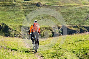 Cyclist on the Beautiful Meadow Trail