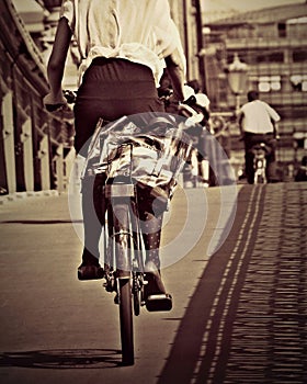 A cyclist on a bridge in Budapest