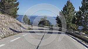 Cyclist climbing Mont Ventoux on his cycle