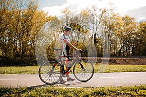 Cyclist, cyclocross training on bike path