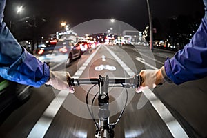 Cyclist drives on the bike path past the traffic jam