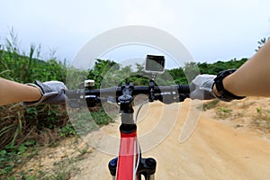 Cyclist hands cycling mountain bike