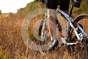 Cyclist on the Meadow Trail at tne Evening