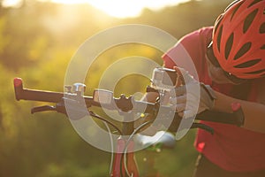 Women cyclist mount the action camera on mountain bike