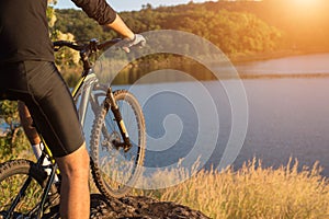 Cyclist on the mountain top of lake, Extreme and adventure life.