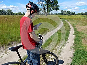 Cyclist navigates by smartphone photo