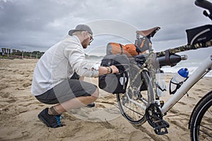 Cyclist Preparing Bicycle