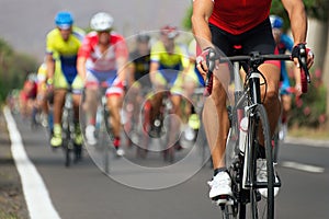 Cyclist in the race on a road bike