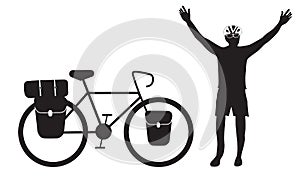 Cyclist raising his hand with touring bike photo