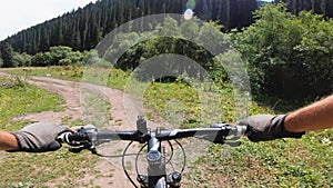 Cyclist ride bicycle at mountain road