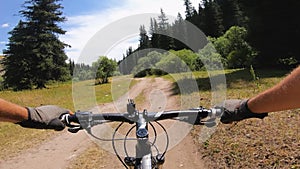 Cyclist ride bicycle at mountain road