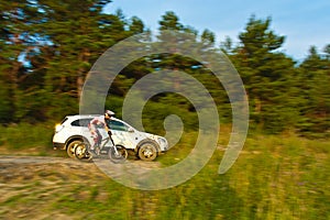 Cyclist ride through the forest