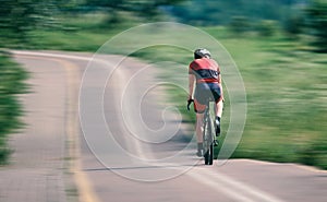 Cyclist rides a bicycle fast. cycling. speed race