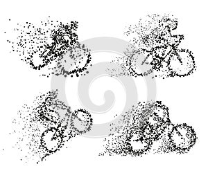 A cyclist rides a bicycle particle divergent silhouette.