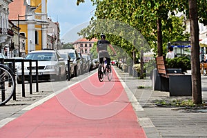 Cyclist rides his bicycle on the bikepath