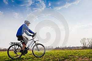 Cyclist Riding the Bike