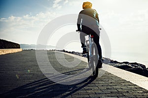 Cyclist riding bike in the coasts