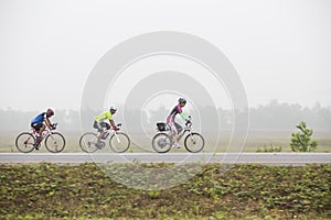 Cyclist riding a bike on an open road