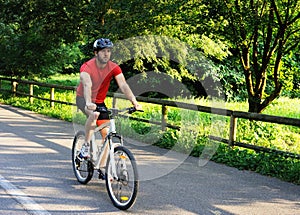 Cyclist riding a bike in the park