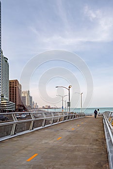 A cyclist riding on the Lakefront Flyover in Chicago. Main streets in Chicago, streets in Illinois