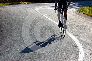 Cyclist riding uphill