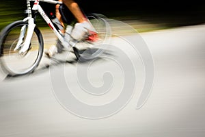 Cyclist on a road bike going fast