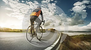 Cyclist on a road at full speed