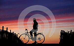 Cyclist At Sunset