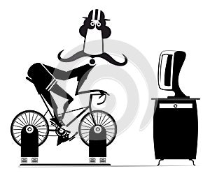 Cyclist trains at home on the exercise bike